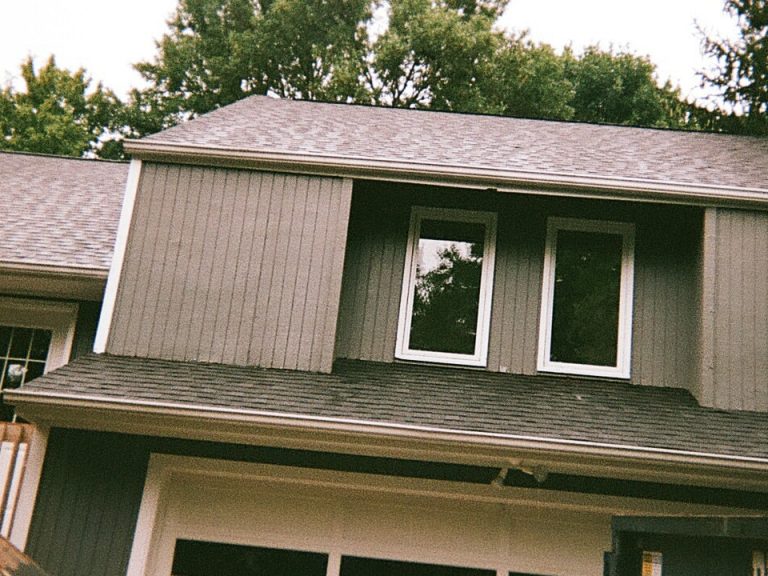 a photo of our roofing contractors finishing a tear-off project